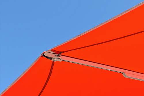 leisure activities orange parasol gliding